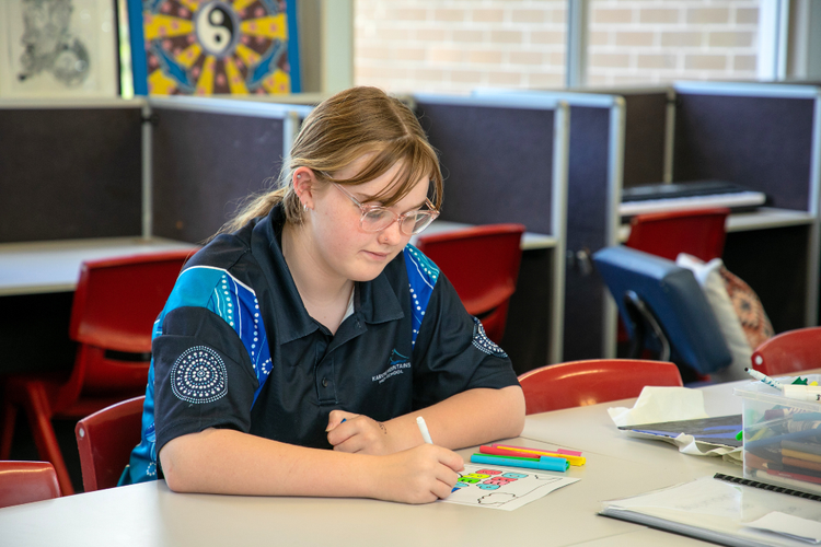 Student working on project in classroom