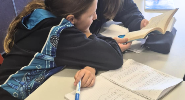 image of Girls studying English in class