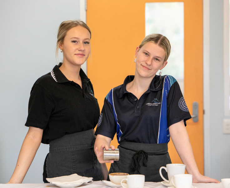 Girls demonstrating barista skills in hospitality