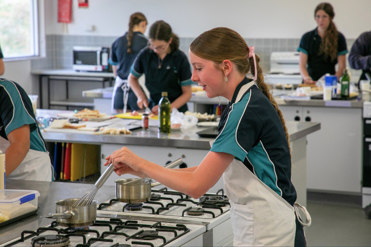 Cooking class in progress at KMHS