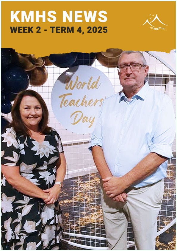 Principal and teacher receiving awards