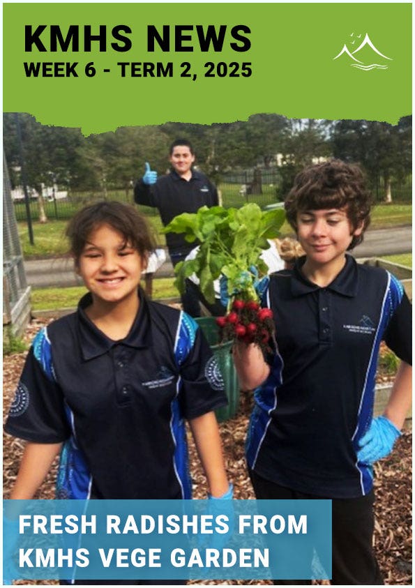 Students showing radishes harvested from the vege garden